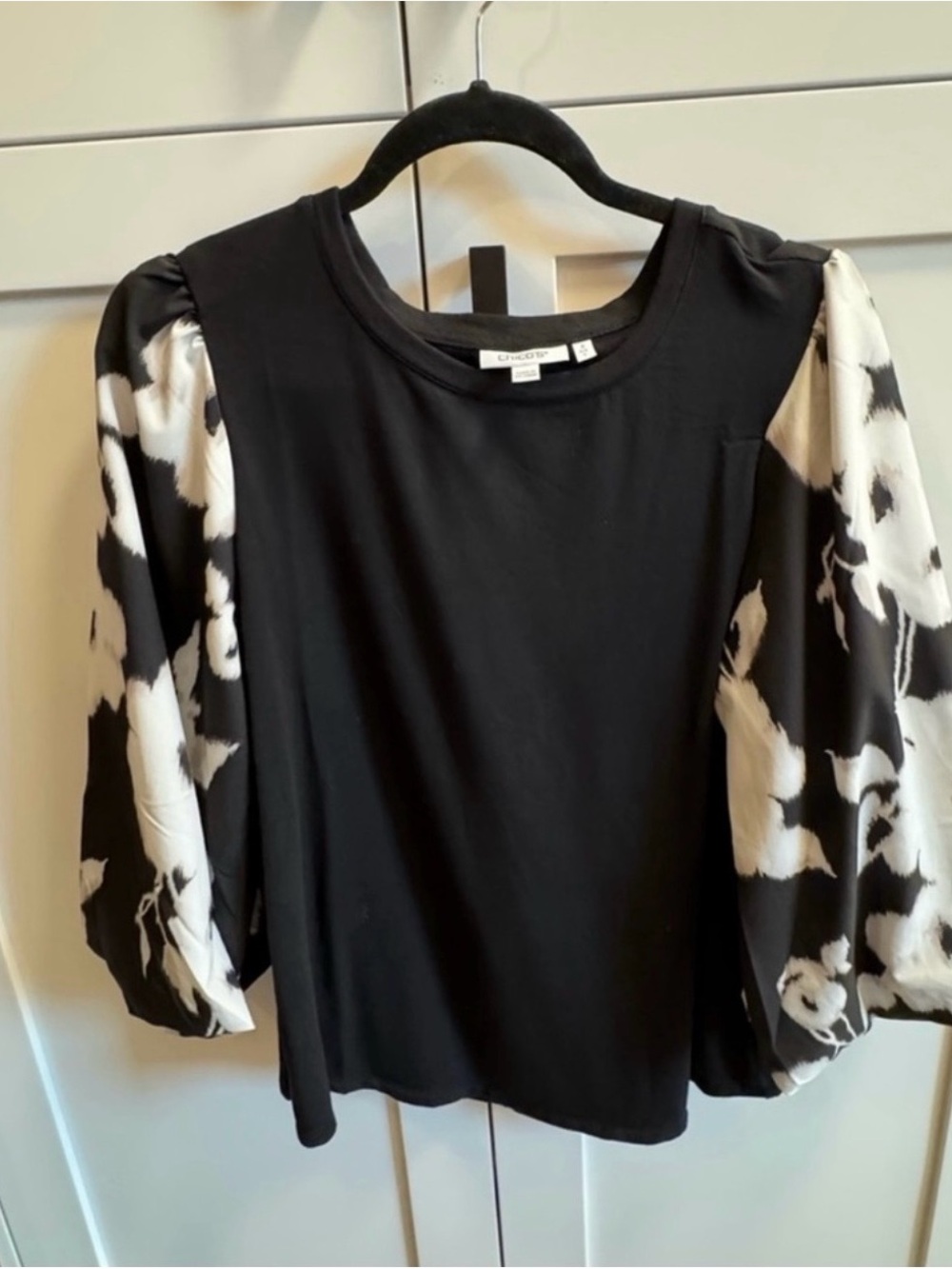 Chico's Black Knit Top with Black-and-White Floral Puff Sleeves